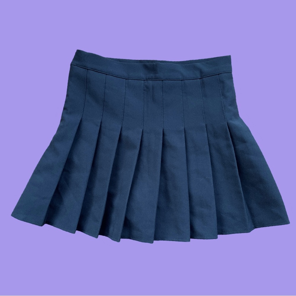 5/25$ Black pleated skirt with shorts underneath | No name